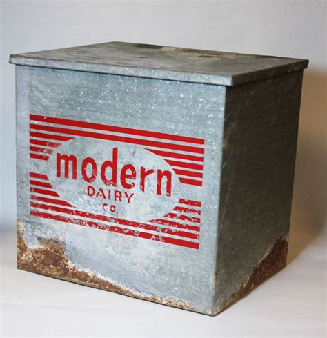 vintage milk bottles in metal box|old fashioned metal milk box.